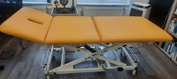 Gebrauchte 3-teilige Therapieliege Vario Nr. 1 in Orange in Seitenansicht